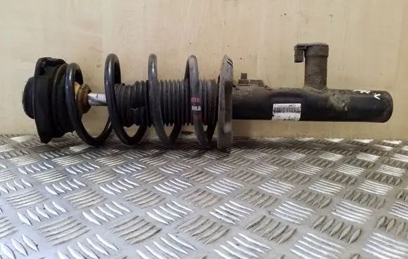 Volkswagen Scirocco Front shock absorber with coil spring 1T0413031HC