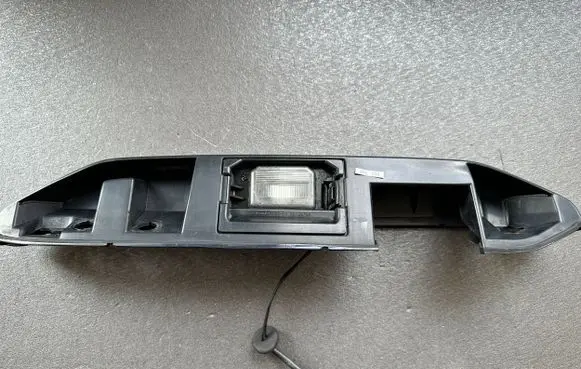 Nissan Patrol Y61 Number plate light 26510VB000