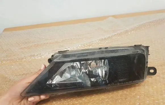 Volkswagen Tiguan Headlight/headlamp 5NA941700B 10472080000