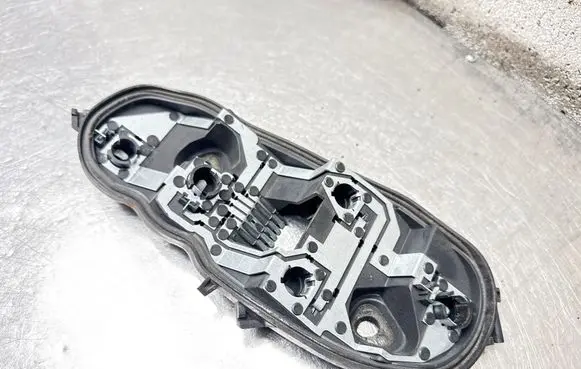 Opel Corsa D Tail light bulb cover holder 89037853