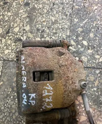 Nissan Almera N16 Front brake caliper