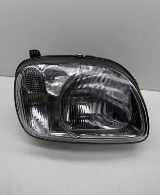 Nissan Micra Headlight/headlamp 205543B