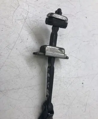 Rear door check strap stopper