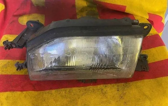 Mazda 323 Headlight/headlamp 11061247