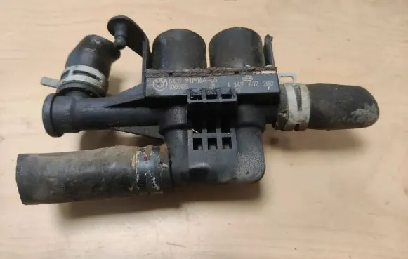 Coolant heater control valve