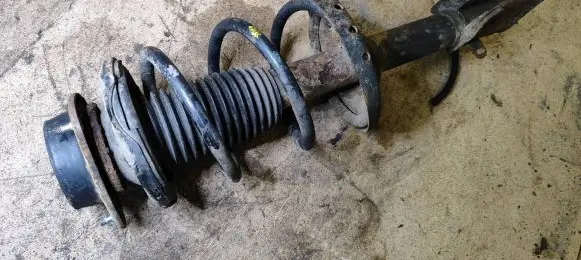Subaru Outback Front shock absorber with coil spring