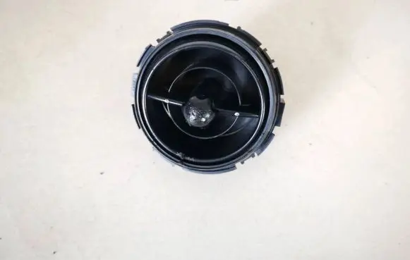 Dash center air vent grill