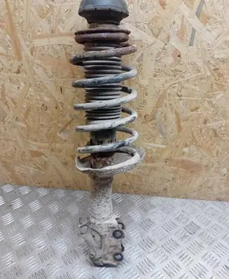 Volkswagen Caddy Front shock absorber with coil spring