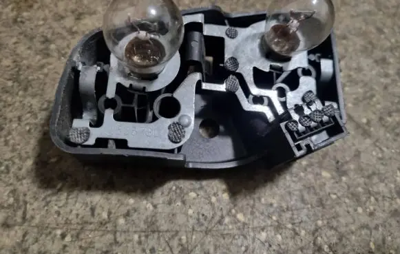BMW 3 E46 Tail light bulb cover holder 230573L