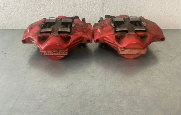 Subaru Impreza II Front brake caliper 