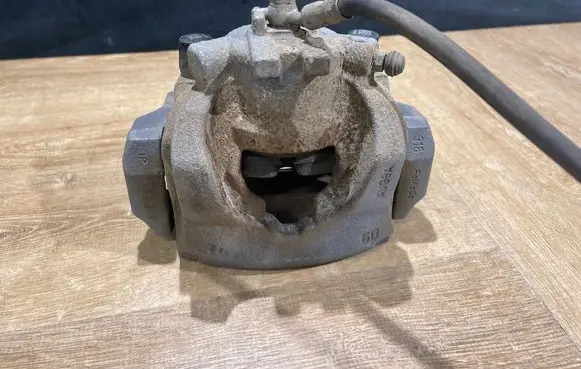 Jaguar XE Front brake caliper GX732078AD K732078AC