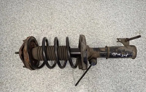 Mazda 323 Front shock absorber with coil spring