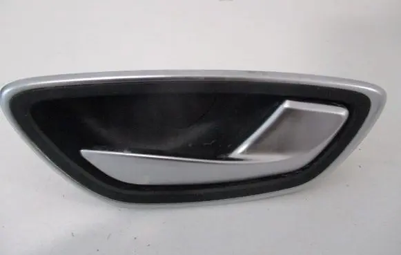 Front door interior handle trim