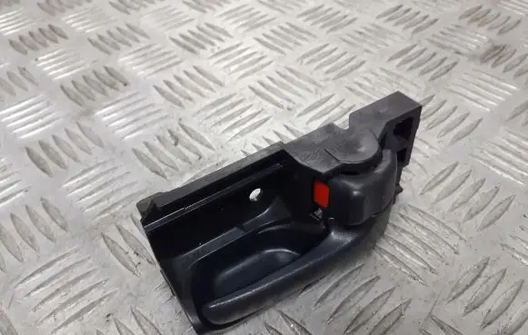 Scion xA Rear door handle trim 