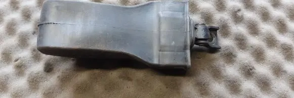 Front door check strap stopper