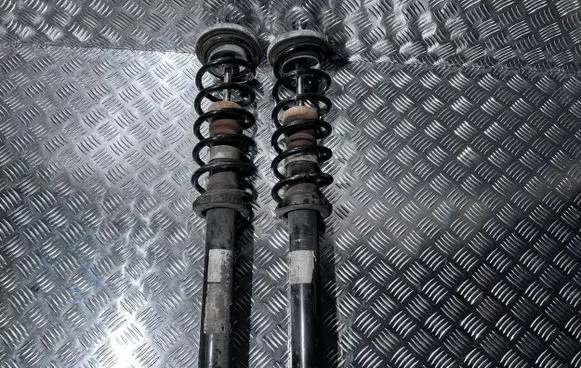 BMW 5 F10 F11 Rear shock absorber with coil spring 6863299 33506863299 A1602070149
