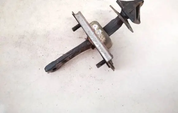 Mazda 323 F Front door check strap stopper 