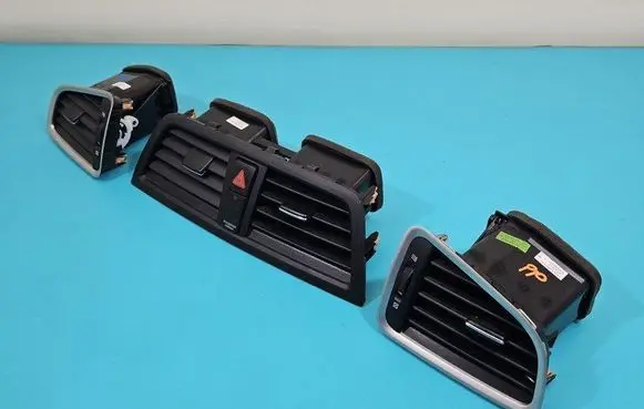 Dash center air vent grill