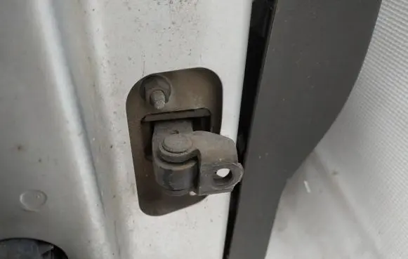 Volvo V50 Front door check strap stopper 