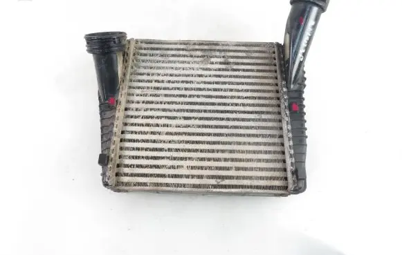 Volkswagen Touareg I Intercooler radiator 7L0145804A