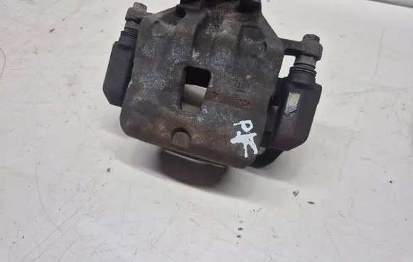 Opel Astra J Front brake caliper 
