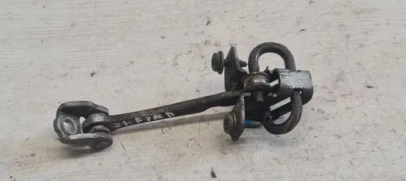 Rear door check strap stopper