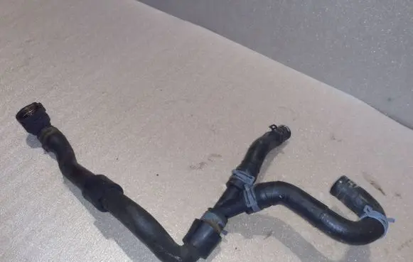 Volkswagen Golf VII Engine coolant pipe/hose 5Q0122051BD