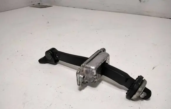 Rear door check strap stopper