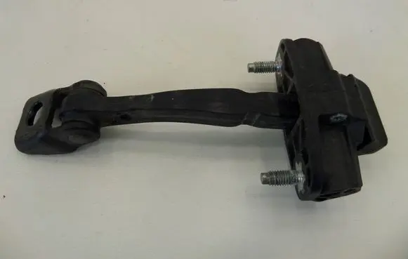 Front door check strap stopper