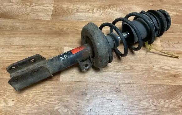 Opel Zafira A Front shock absorber with coil spring JGM2348T