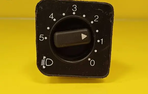 Headlight level height control switch