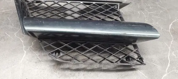 Mitsubishi Outlander Front bumper upper radiator grill MR971688