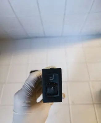 Seat heating switch