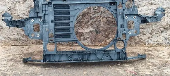 Radiator support slam panel