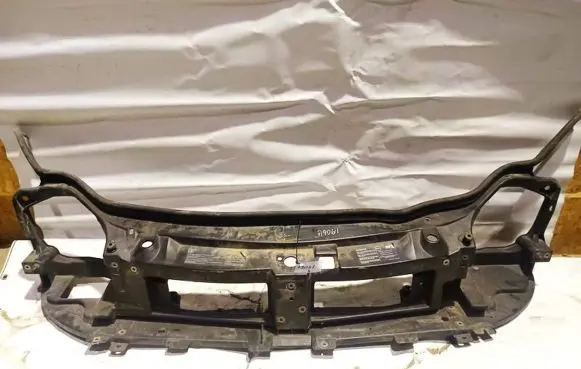 Radiator support slam panel