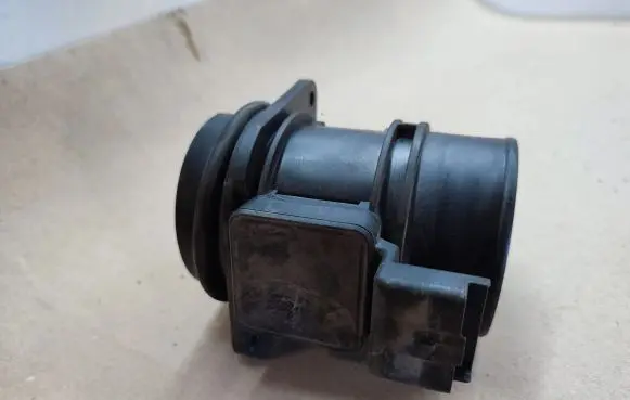 Renault Megane II Mass air flow meter 7700109812