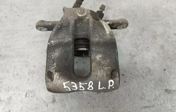 Renault Clio III Front brake caliper 