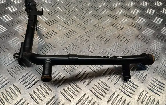 Volkswagen Golf V Engine coolant pipe/hose 038121065CS