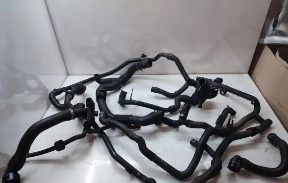 Volkswagen PASSAT CC Engine coolant pipe/hose 03L121065
