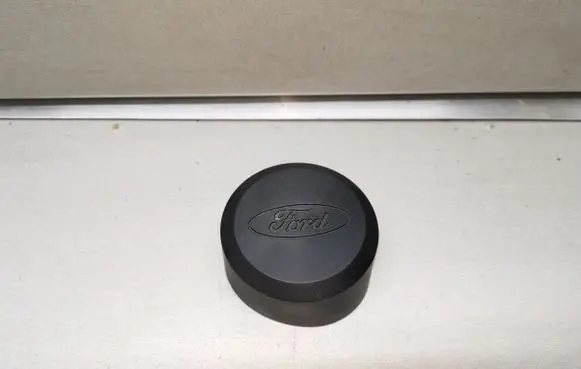 Ford Escort Original wheel cap 81AB1130DD