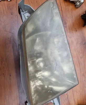 Mazda 323 Headlight/headlamp 205571B