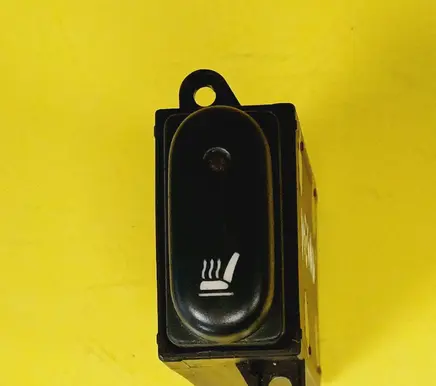 Seat heating switch