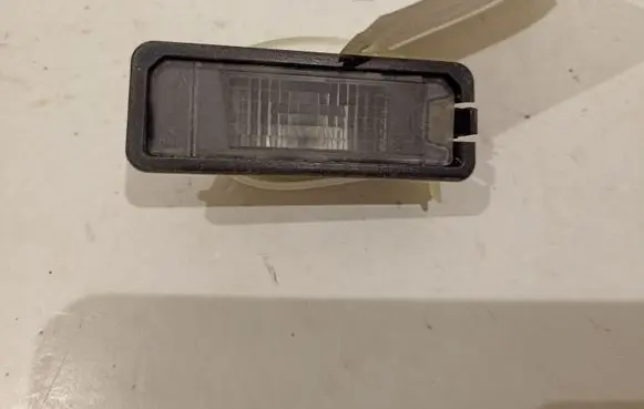 Volkswagen PASSAT B7 Number plate light 1K8943021