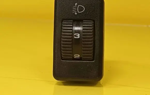 Volkswagen Golf III Headlight level height control switch 357941333