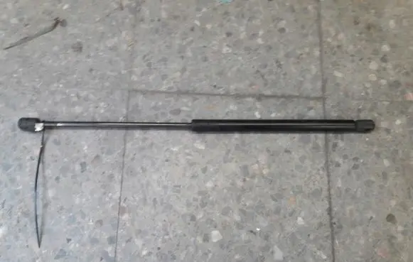 Volkswagen Golf II Tailgate strut 191827550B
