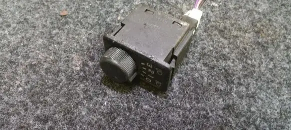 Headlight level height control switch
