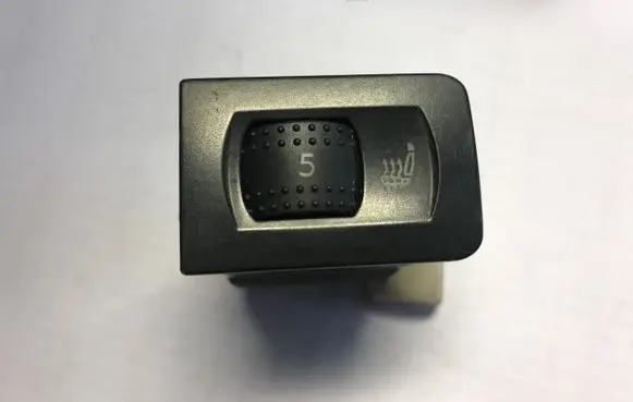 Seat heating switch