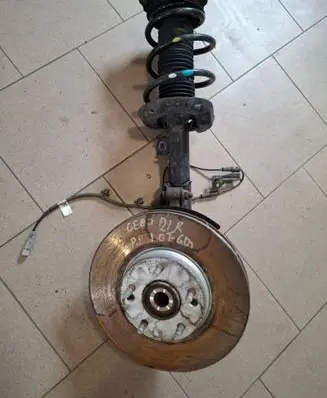 Front wheel hub spindle knuckle