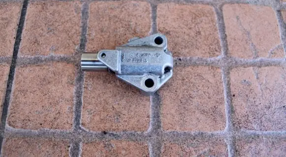 Opel Meriva A Timing belt tensioner 55197785