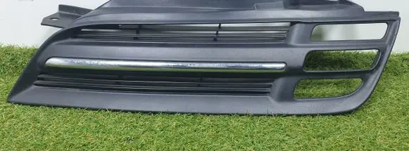 Nissan Micra Front fog light trim/grill 62330AX600